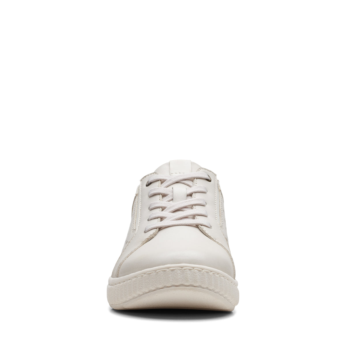 Front view of an off-white sneaker with laces.
