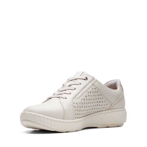 Beige leather sneaker with perforated side and lace-up closure.
