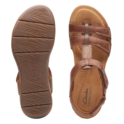 Pair of brown sandals showing the sole and top, the top has an adjustable strap.