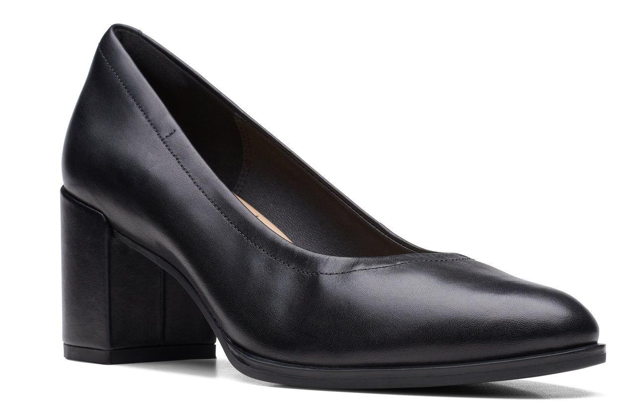 Black leather pump with block heel.
