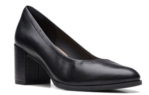 Black leather pump with block heel.