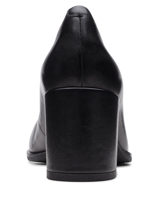 Black leather block heel shoe, back view.