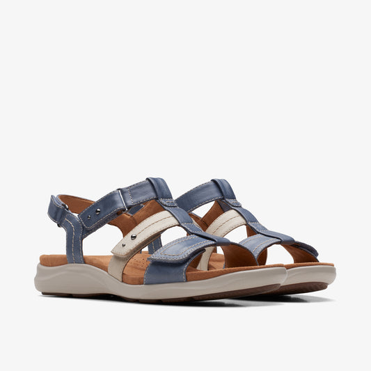 Pair of blue, beige, and brown sandals with multiple straps and an ankle strap.