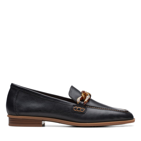 Black leather loafer with chain detail on a low heel.