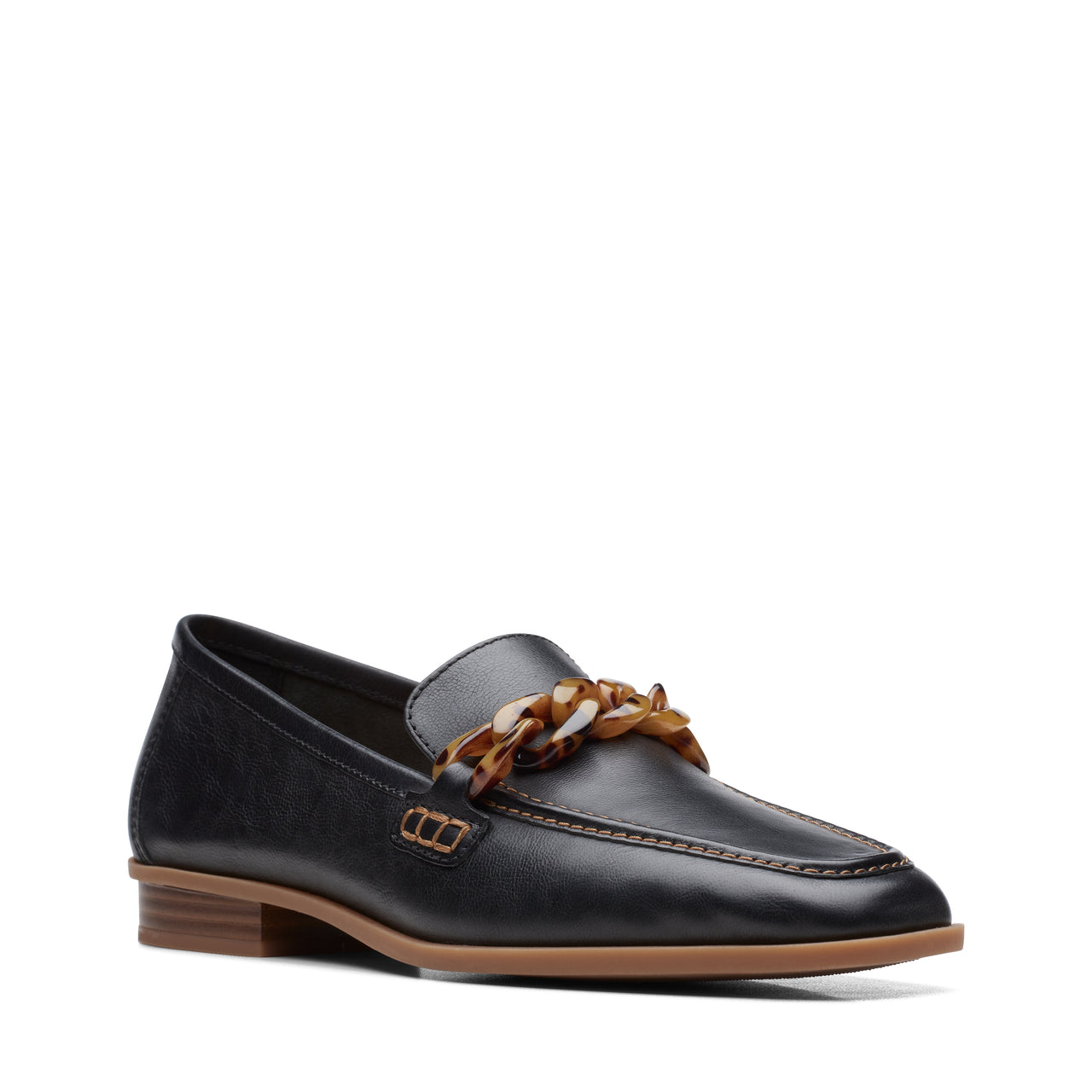 Black leather loafer with brown chain detail on top, brown sole.