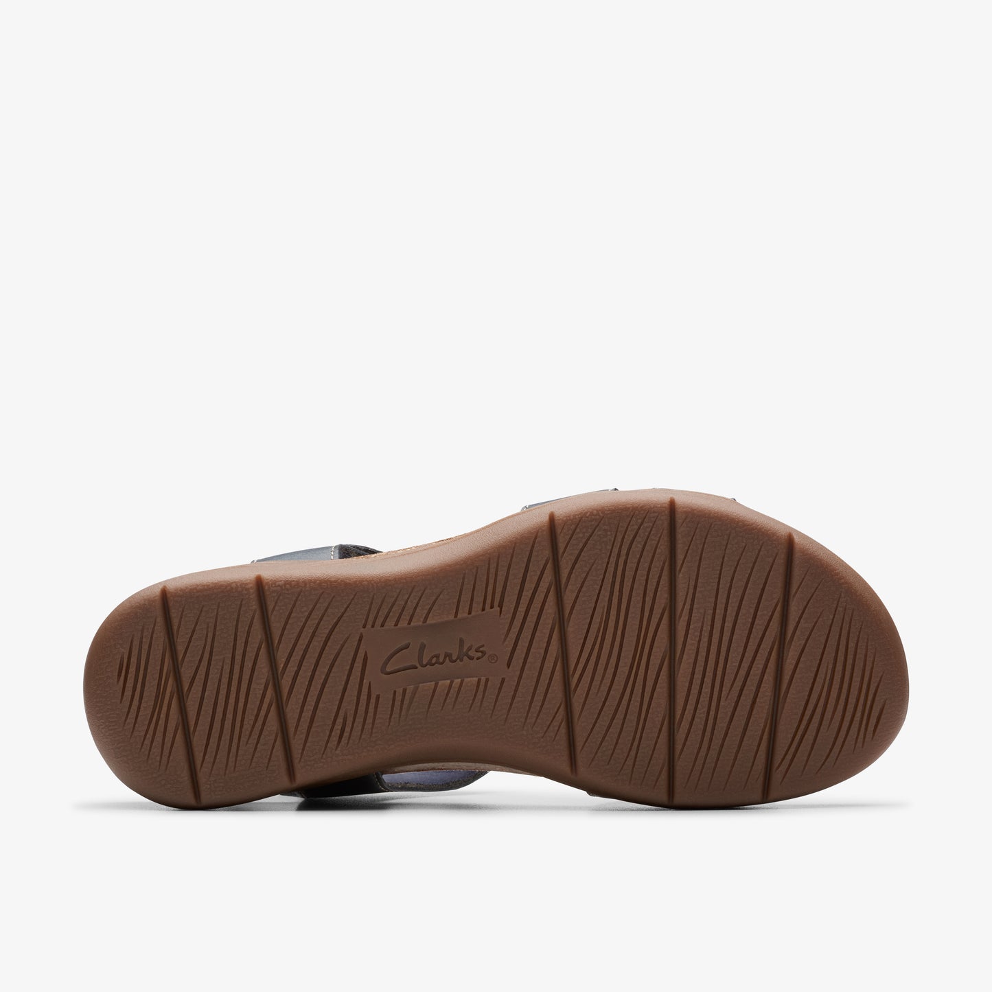Brown rubber sole with ridges and 'Clarks' text.