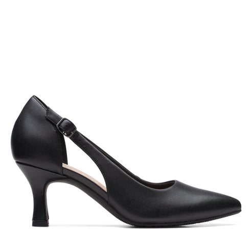 Black high heel with an ankle strap and a pointed toe.