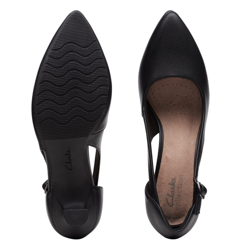A pair of black leather pointed-toe high heels, showing the sole with a wavy pattern, the insole with 'Clarks Collection' imprint and a sling back.