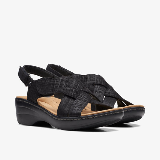 Black sandals with adjustable strap and crossed front.