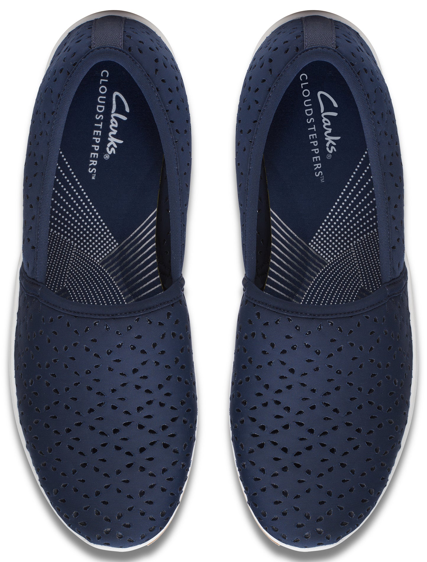 A pair of navy blue, perforated slip-on shoes with white soles, as seen from above.