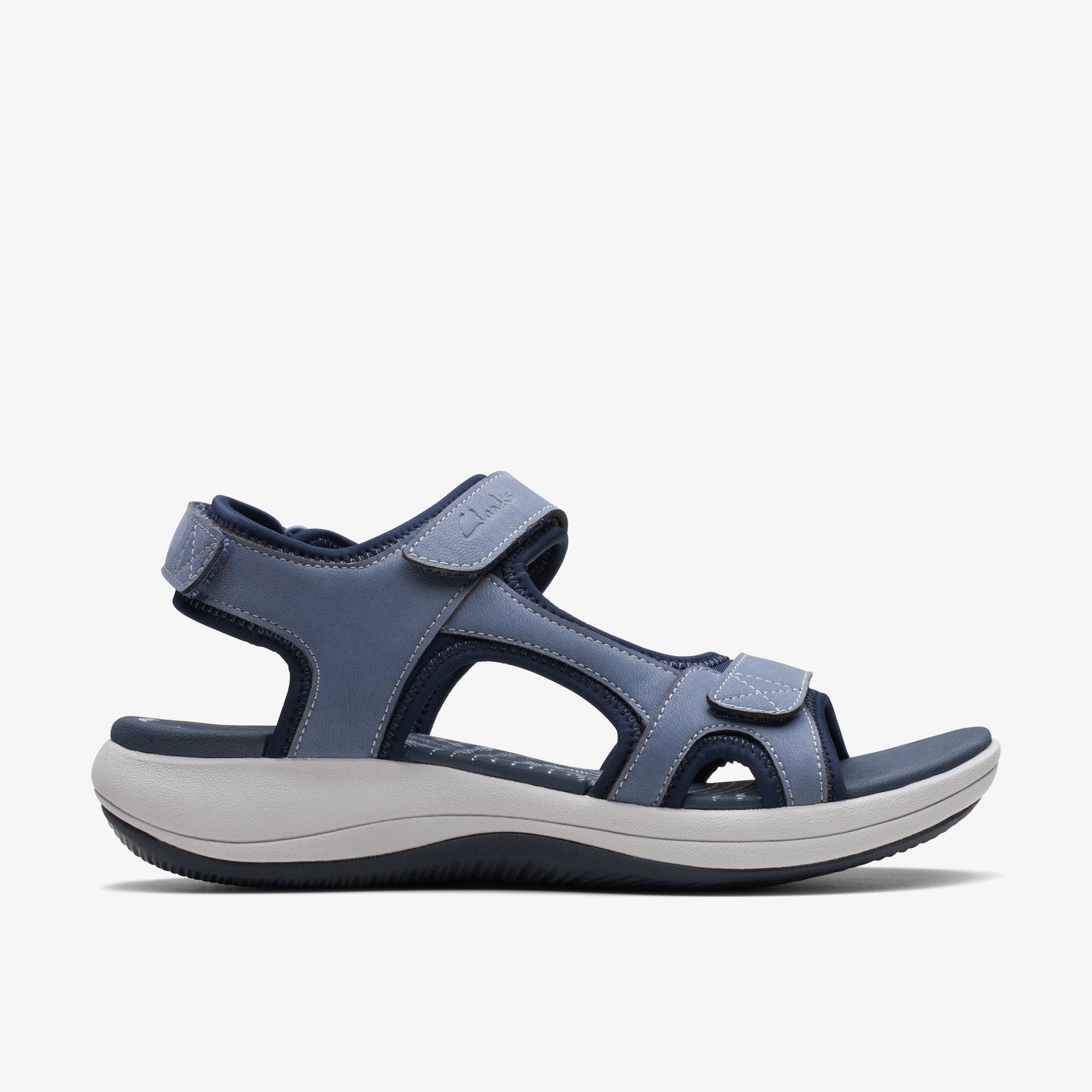 Blue sandal with velcro straps and a thick sole.