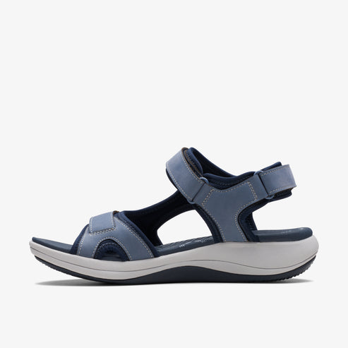 Blue sandal with velcro straps and a thick sole.