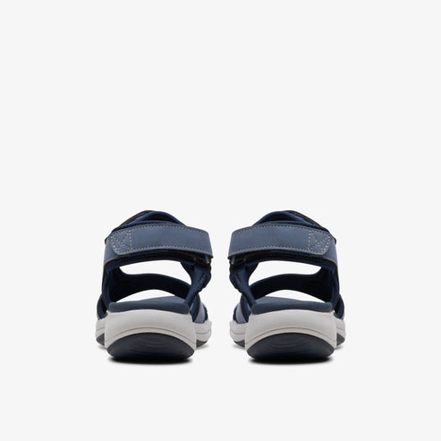 Rear view of navy sandals with velcro strap.