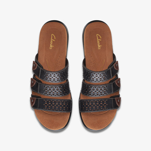 Pair of brown and black slide sandals with three straps; 'Clarks' text on insole.
