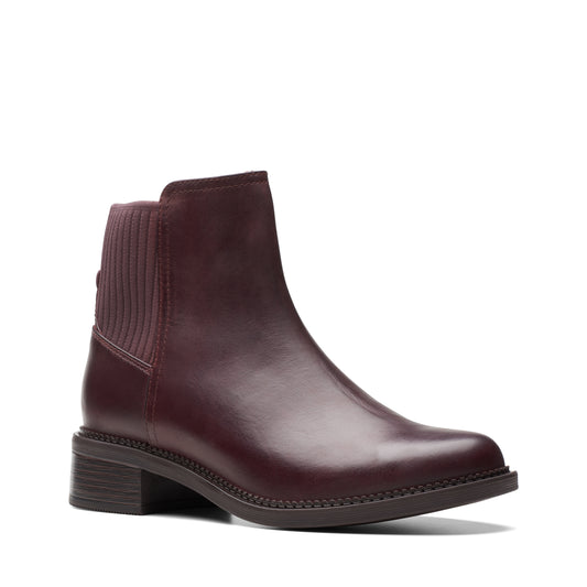 Maroon ankle boot with block heel and ribbed back detail.