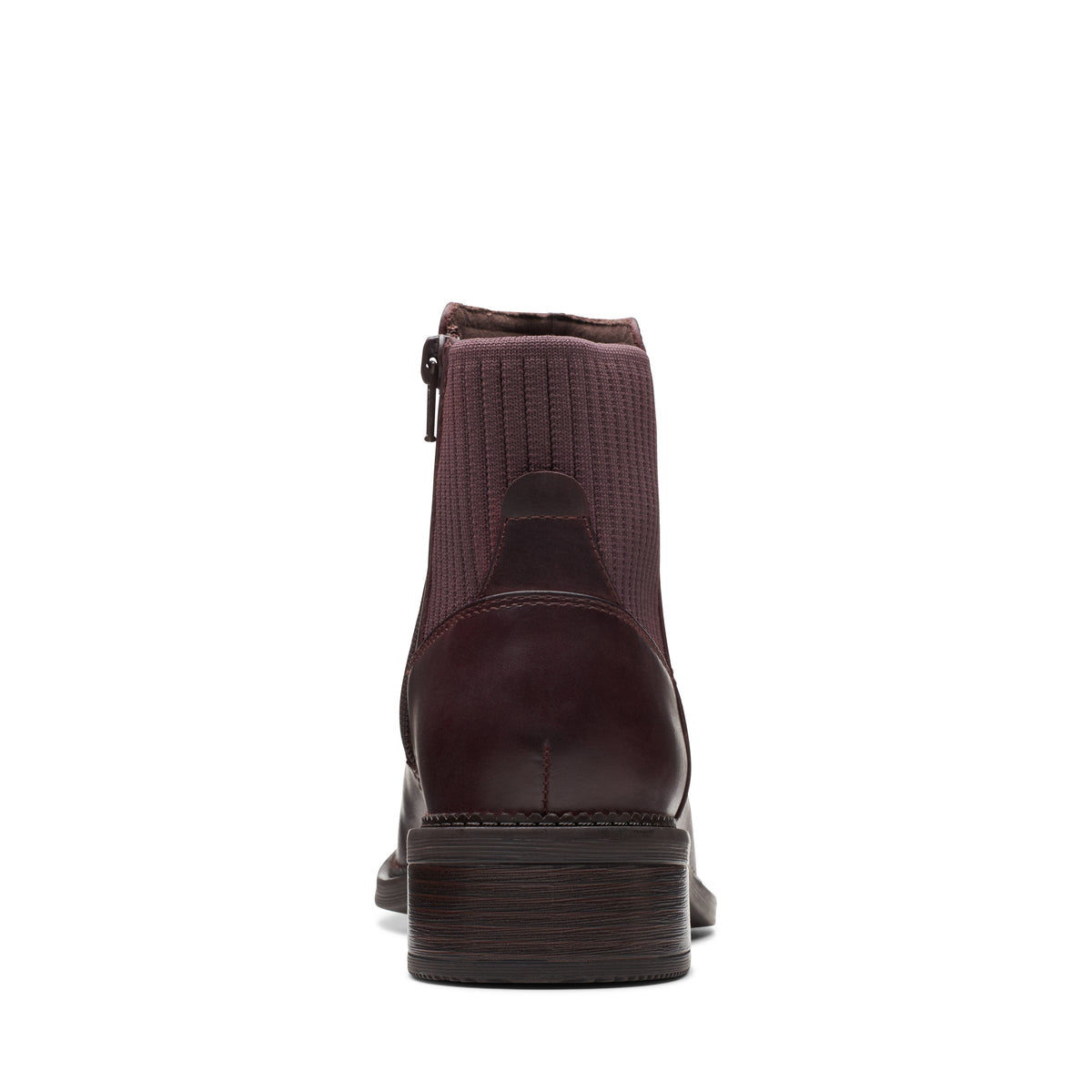 Burgundy ankle boot with ribbed stretch knit upper and zipper closure.