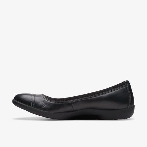 Black ballet flat with a rounded toe and a low heel