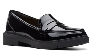 Black patent leather loafer with a chunky black sole.