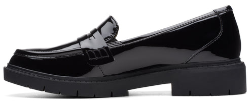 A black patent leather loafer with a chunky sole.