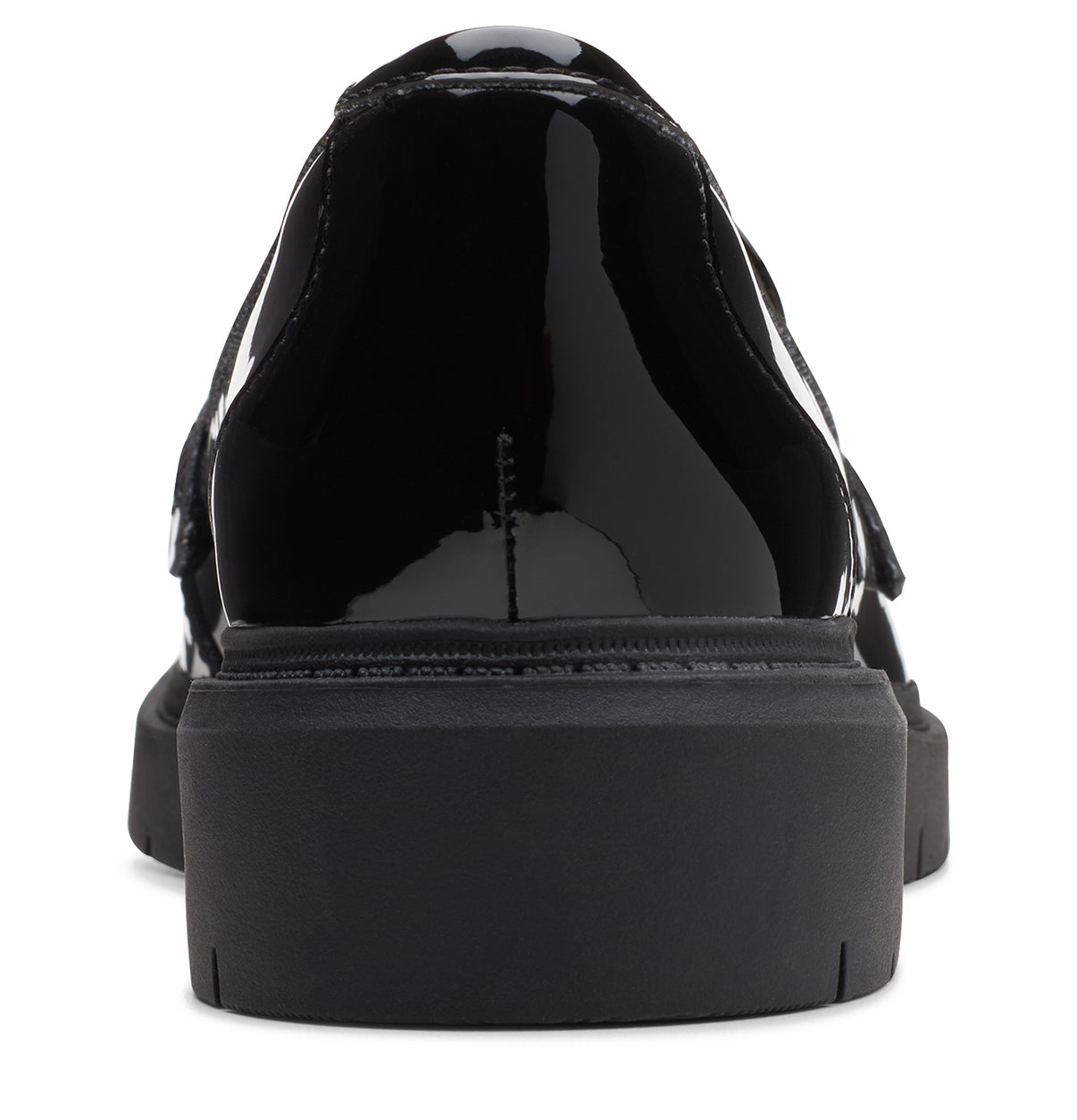Back view of a shiny black patent leather platform dress shoe with a low heel.