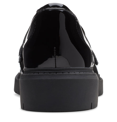 Back view of a shiny black patent leather platform dress shoe with a low heel.