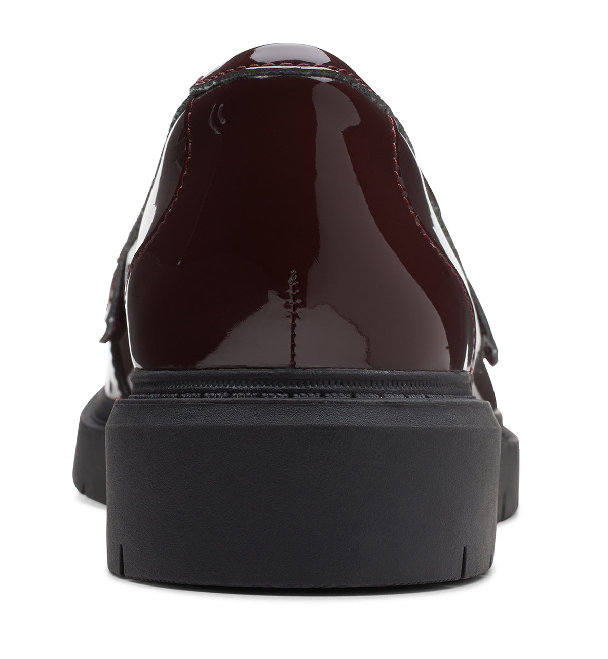Back view of a shiny, dark-red patent leather Mary Jane shoe with a thick, black platform sole.