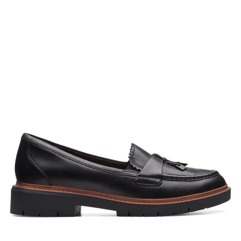Black leather loafer with tassel.