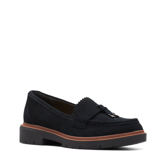Black loafer with tassel and lug sole.