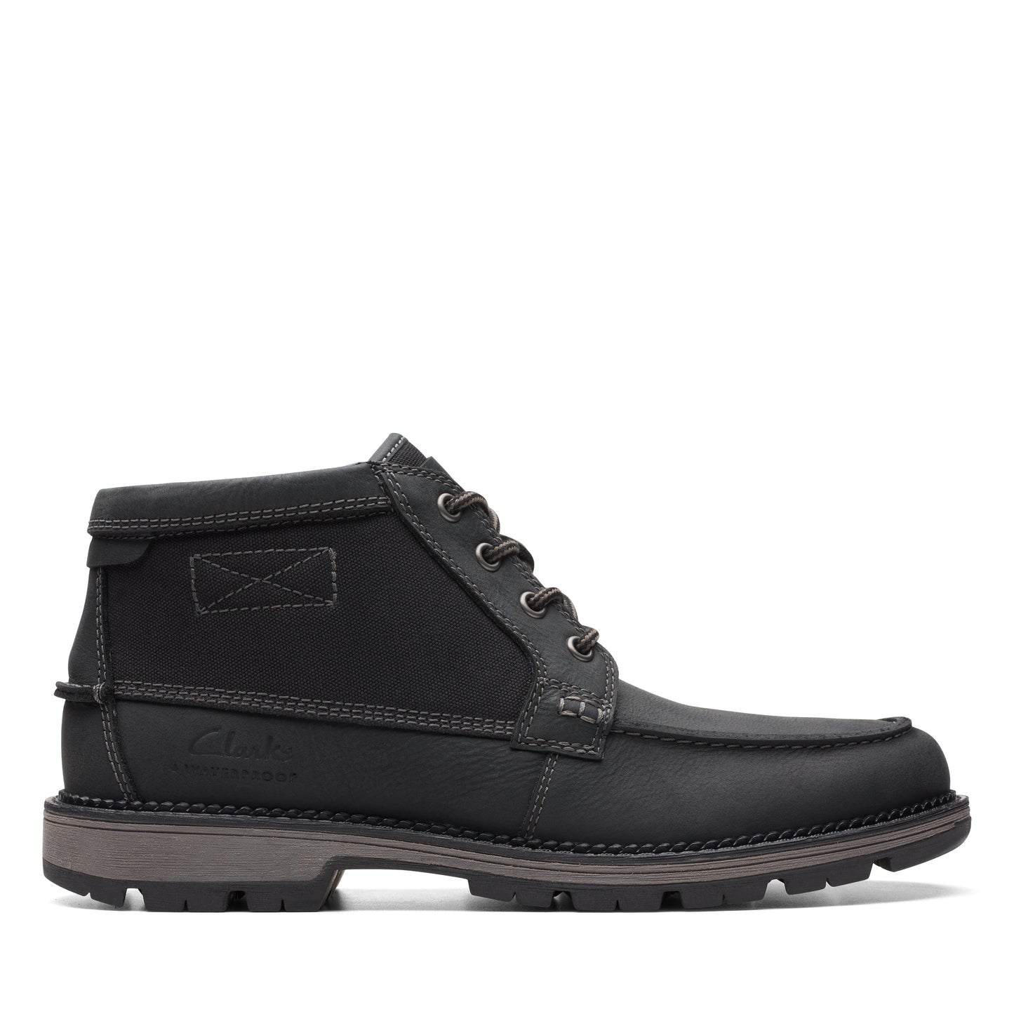 Black leather, ankle-high work boot with stitching details and a gray sole.