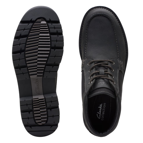 Top-down view of a black leather moccasin shoe with laces, next to a black shoe sole with thick treads and logo. "clarks collection" visible on the insole.
