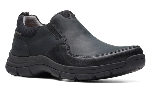 Black slip-on shoe with a rounded toe and low profile heel.