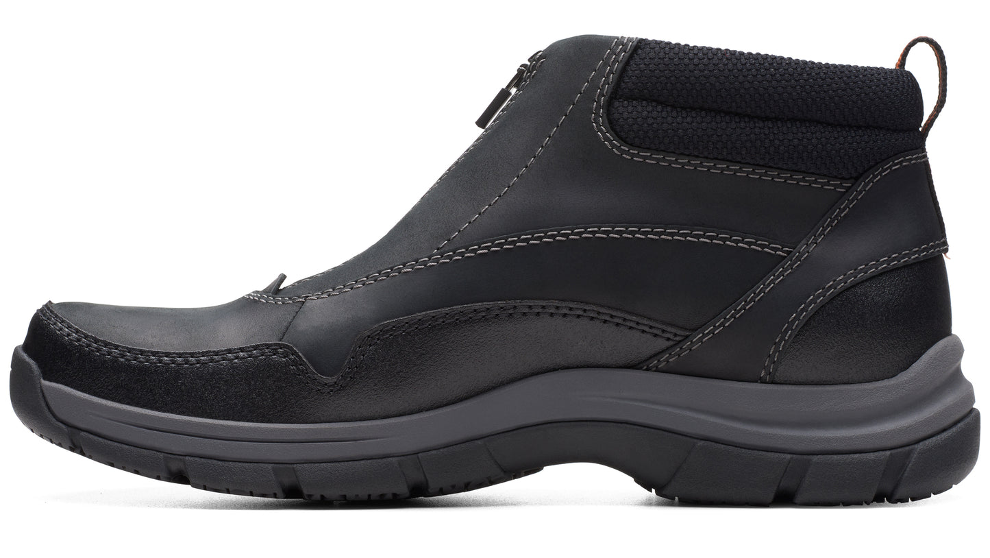 Black, ankle-high, weatherproof boot with a front zipper and a thick, gray sole.