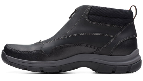 Black, ankle-high, weatherproof boot with a front zipper and a thick, gray sole.
