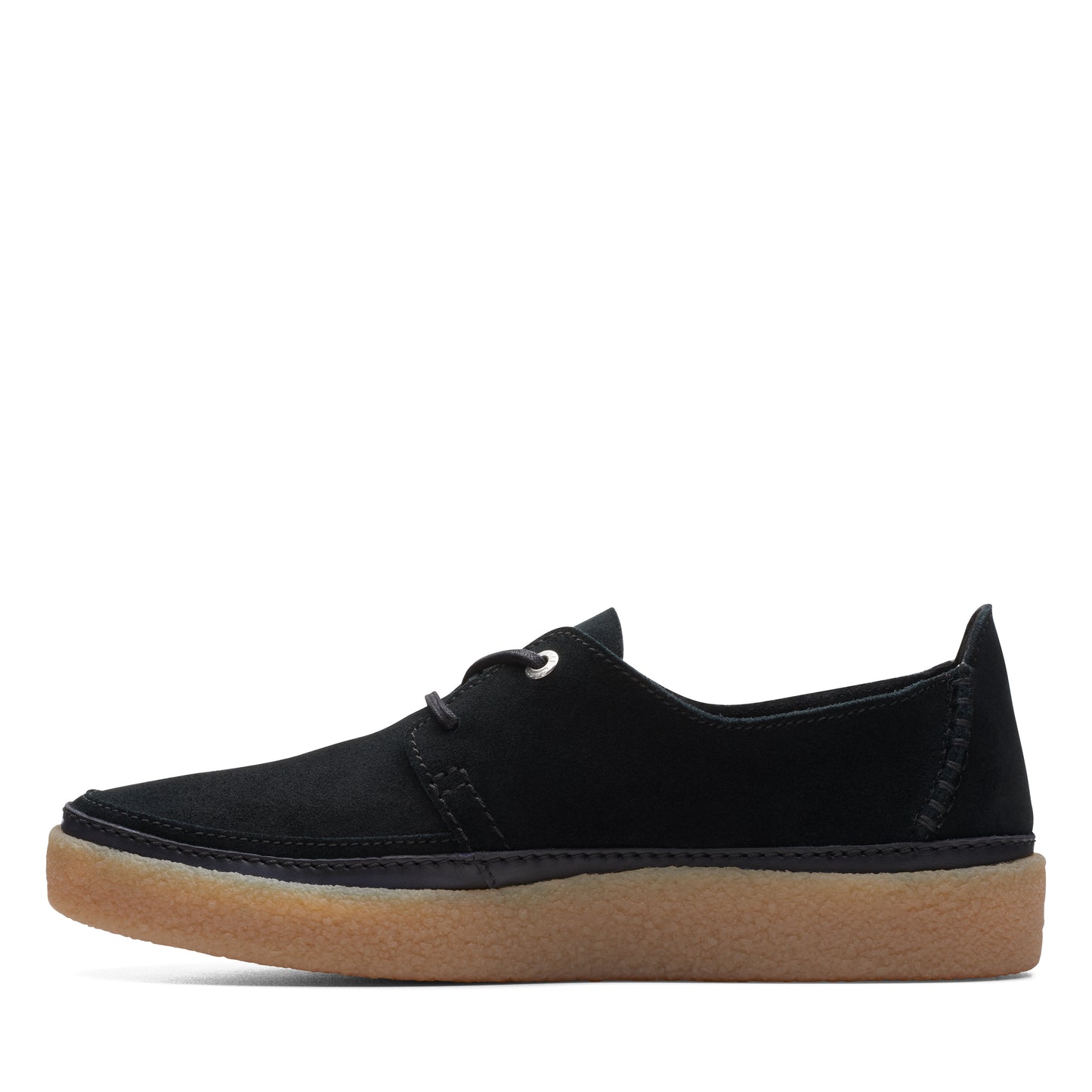 Low profile black lace up shoe with tan rubber sole.