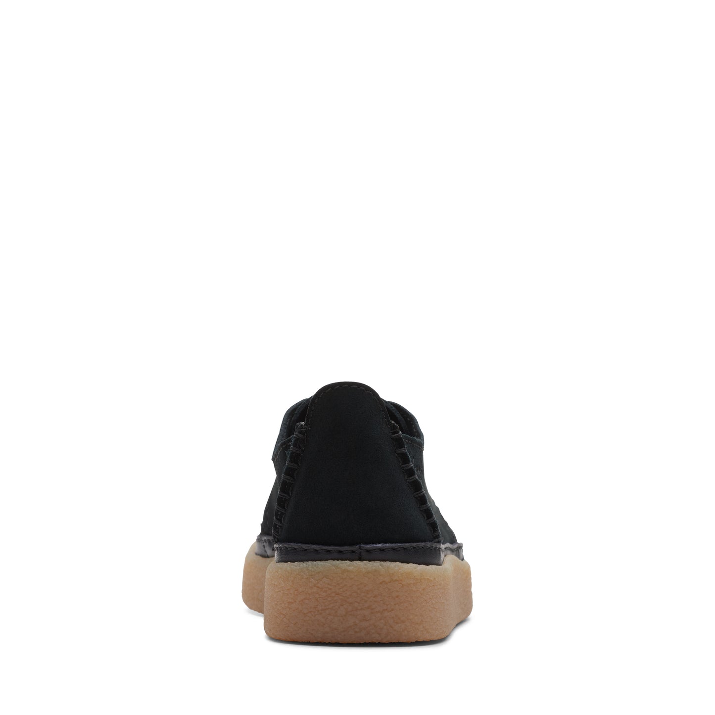Low-profile black suede shoe with beige sole, viewed from the back.