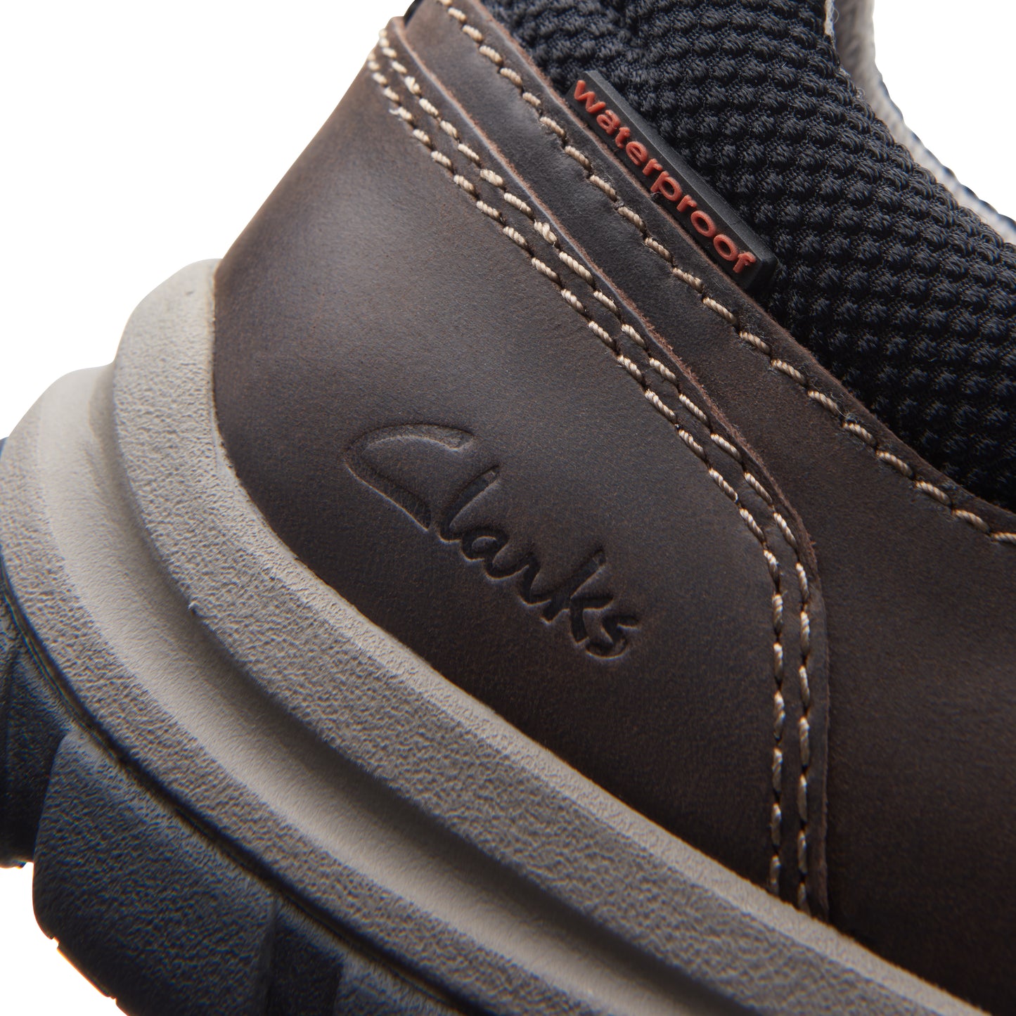 close up of a shoe embossed with 'Clarks' and the word waterproof