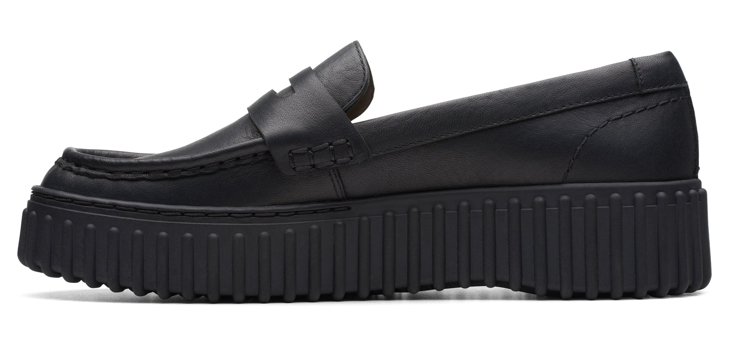 Black leather loafer with a thick, ribbed sole.