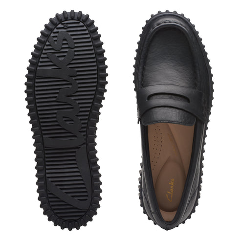 A pair of black penny loafers showing a bottom view of a textured sole spelling out "Clarks" and a top view of the leather shoe.