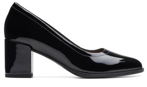 Black patent leather pump with a block heel.