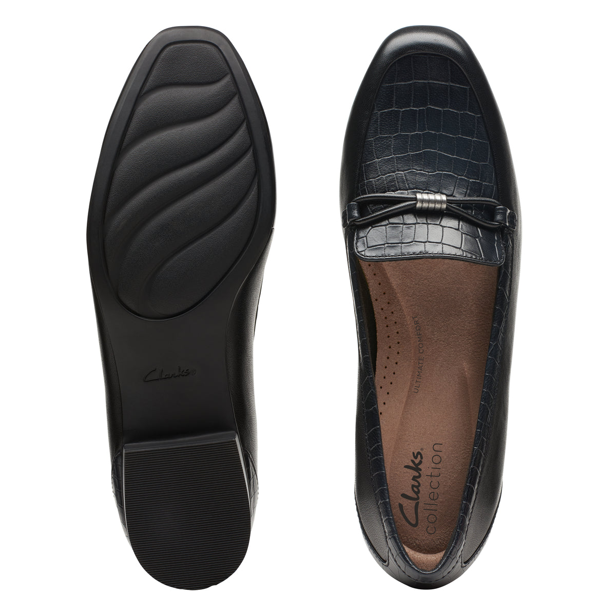 Two views of a dark blue, flat leather loafer; one showing the ridged sole, the other the insole and textured bow.