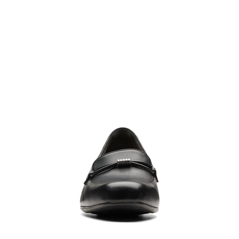 Black leather penny loafer with a small decorative strap across the vamp.