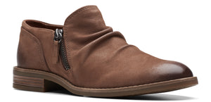 A brown ankle boot with a side zipper and a slight heel.