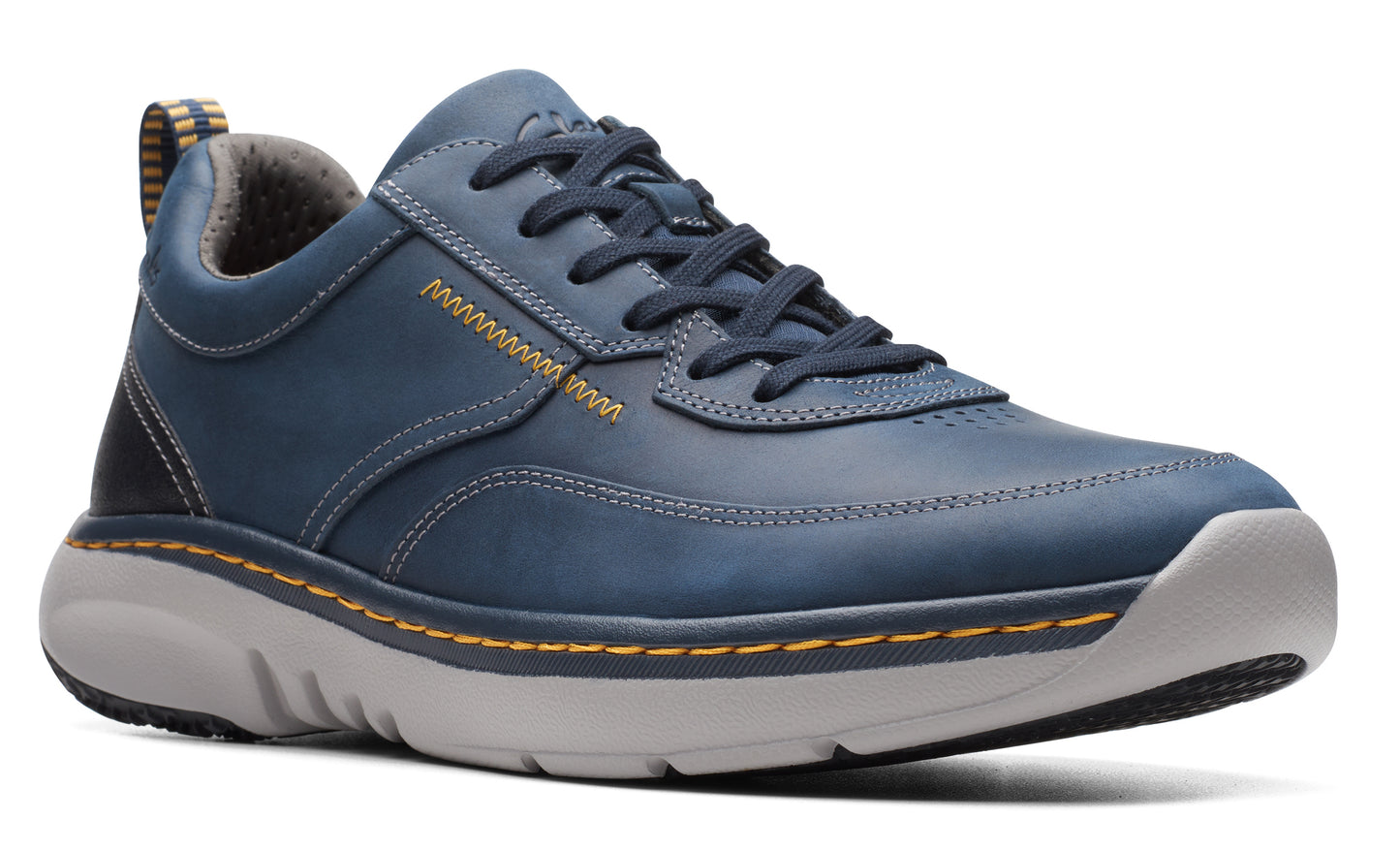 Blue leather sneaker with gray sole and yellow stitching.