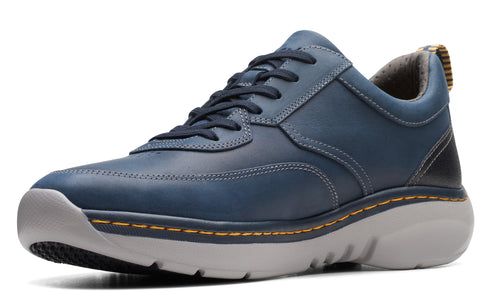 A blue leather sneaker with gray sole and dark laces.