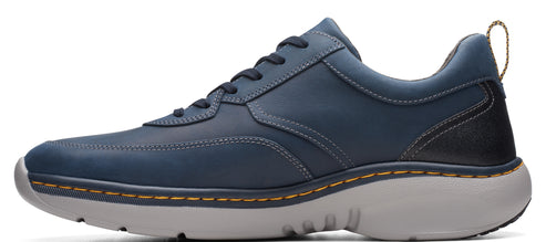 A blue leather shoe with grey sole.