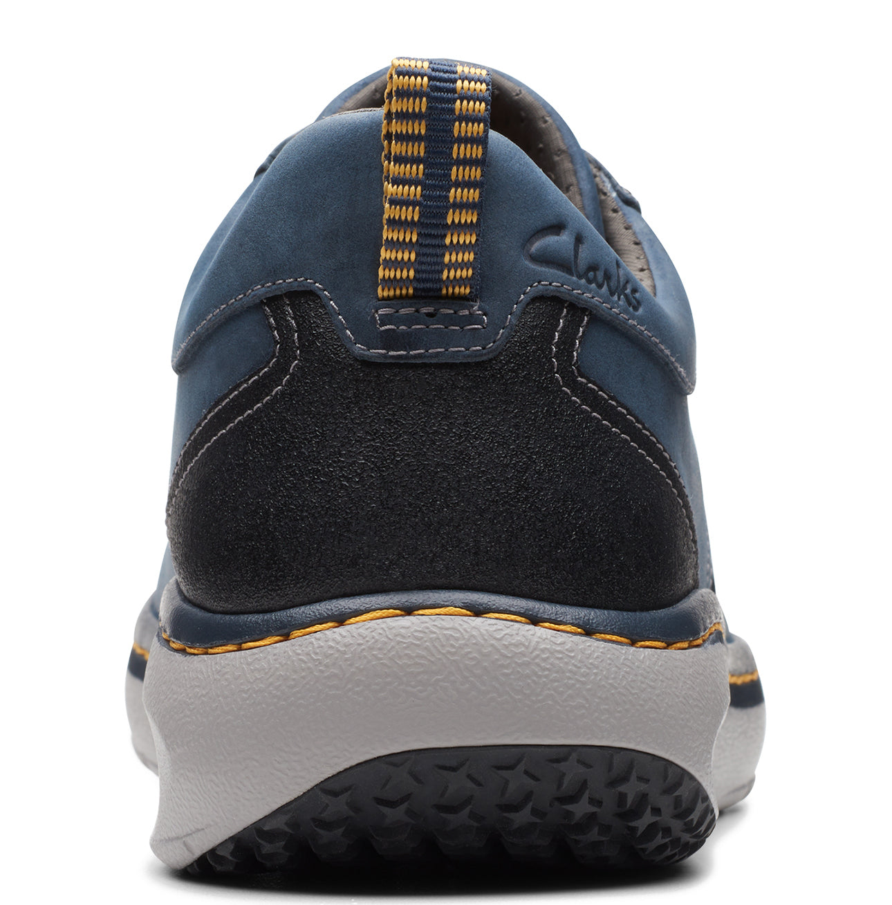 Back view of a blue casual shoe with a gray sole.