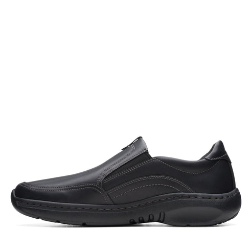 Black slip-on dress shoe with rounded toe and subtle stitching details.