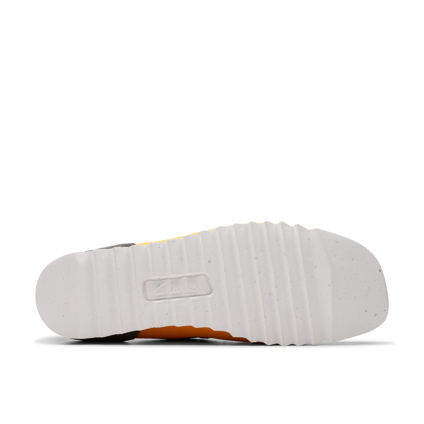 Bottom view of a shoe with a white sole with a grid pattern.