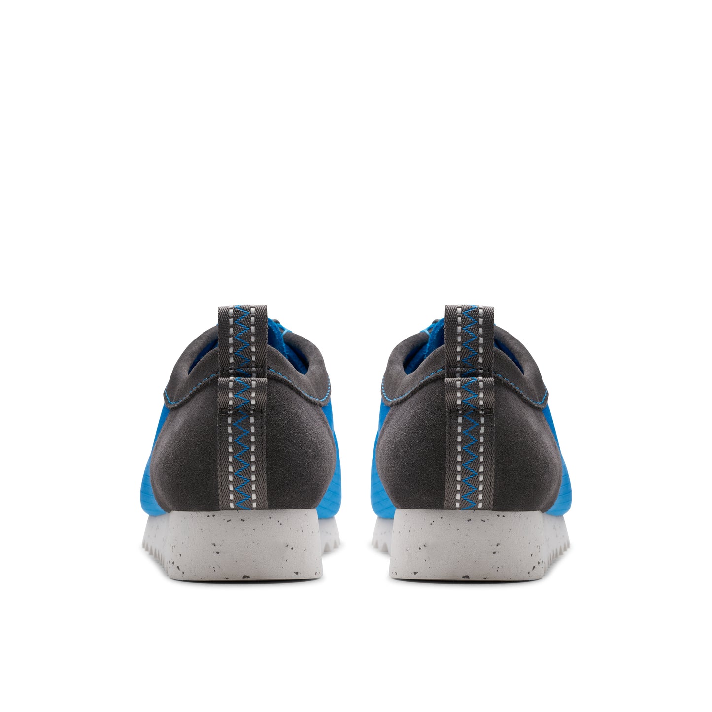 Rear view of two blue and grey low top shoes.