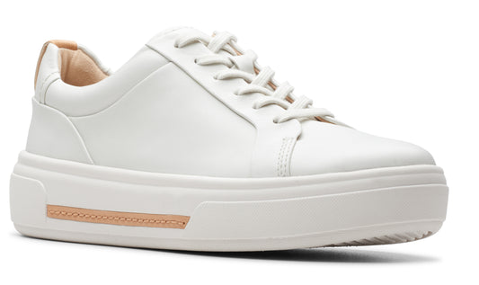 White platform sneaker with laces and light tan accents